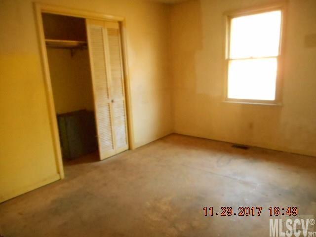 921 Engineer Road Bostic, NC 28018 - Photo 7 of 13 a view of an empty room with a window