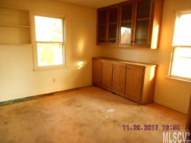 921 Engineer Road Bostic, NC 28018 - Photo 9 of 13 an empty room with windows