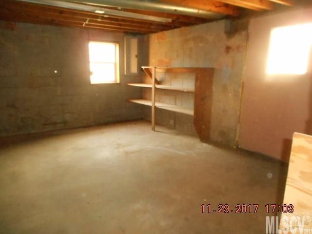 921 Engineer Road Bostic, NC 28018 - Photo 10 of 13 an empty room with windows