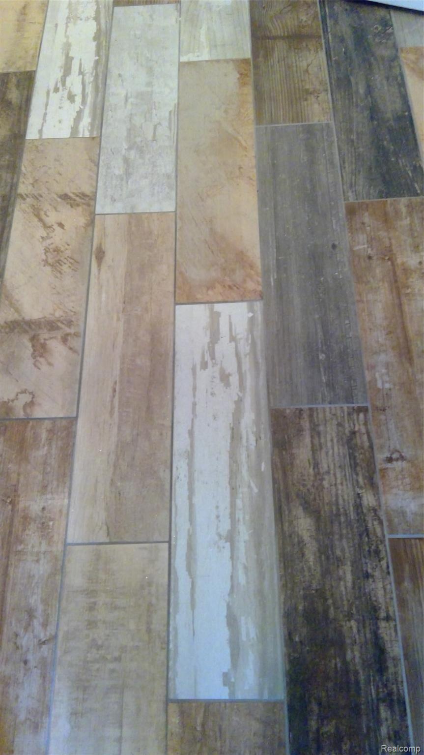 1297 Lamplighter Lane Rochester, MI 48306 - Photo 19 of 32 Ceramic tile flooring in master bath