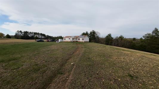 183 Smith Farm Road Northeast Check, VA 24072 - Photo 12 of 23 a view of a big yard with plants and large trees