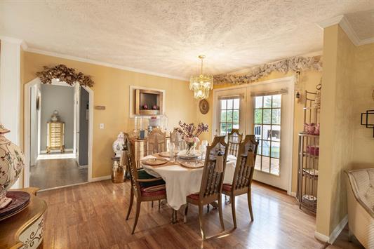 183 Smith Farm Road Northeast Check, VA 24072 - Photo 15 of 23 a view of a dining room with furniture and wooden floor