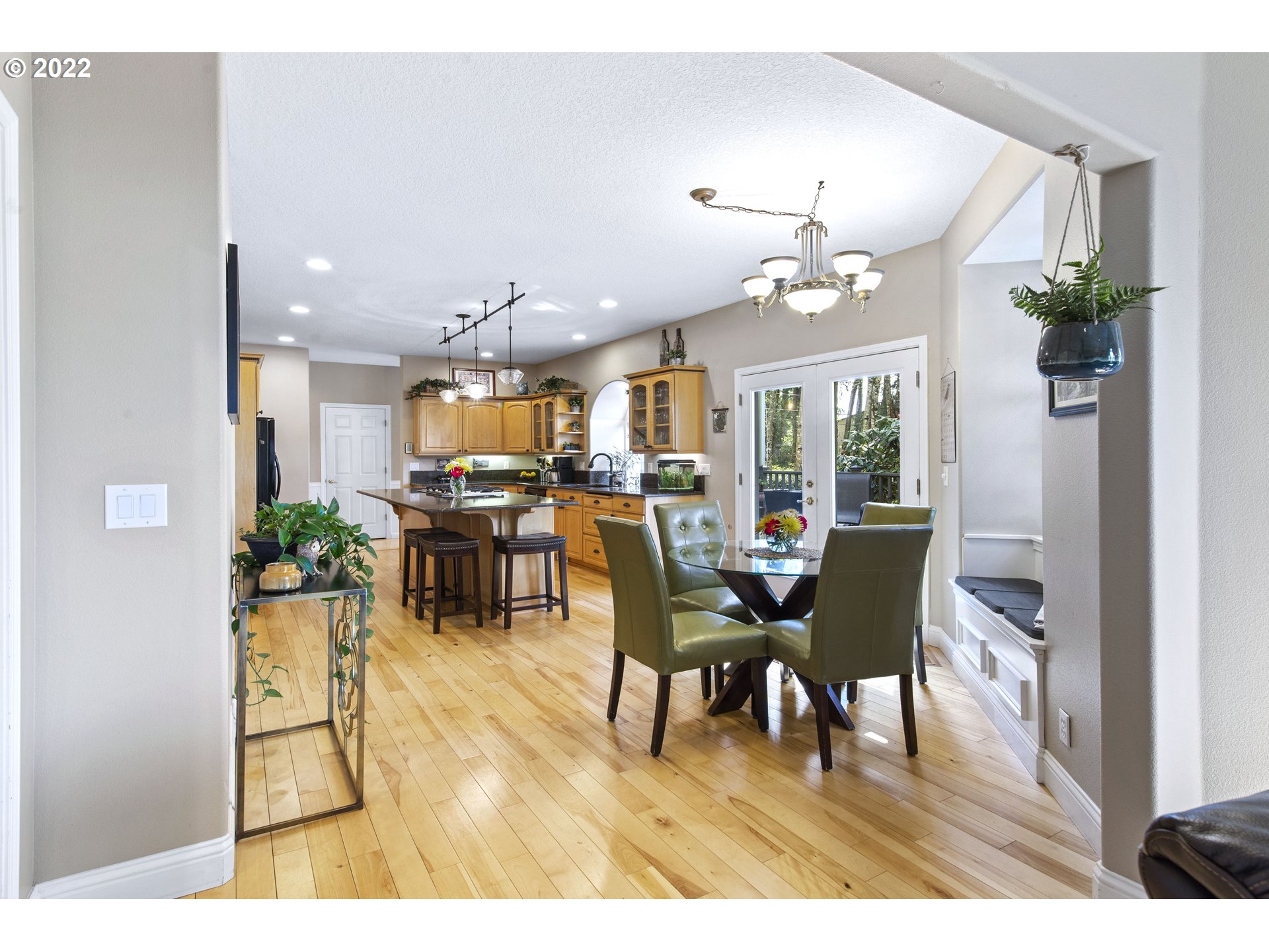 28501 Northeast 67th Street Camas, WA 98607 - Photo 17 of 32 a view of a dining room with furniture and wooden floor