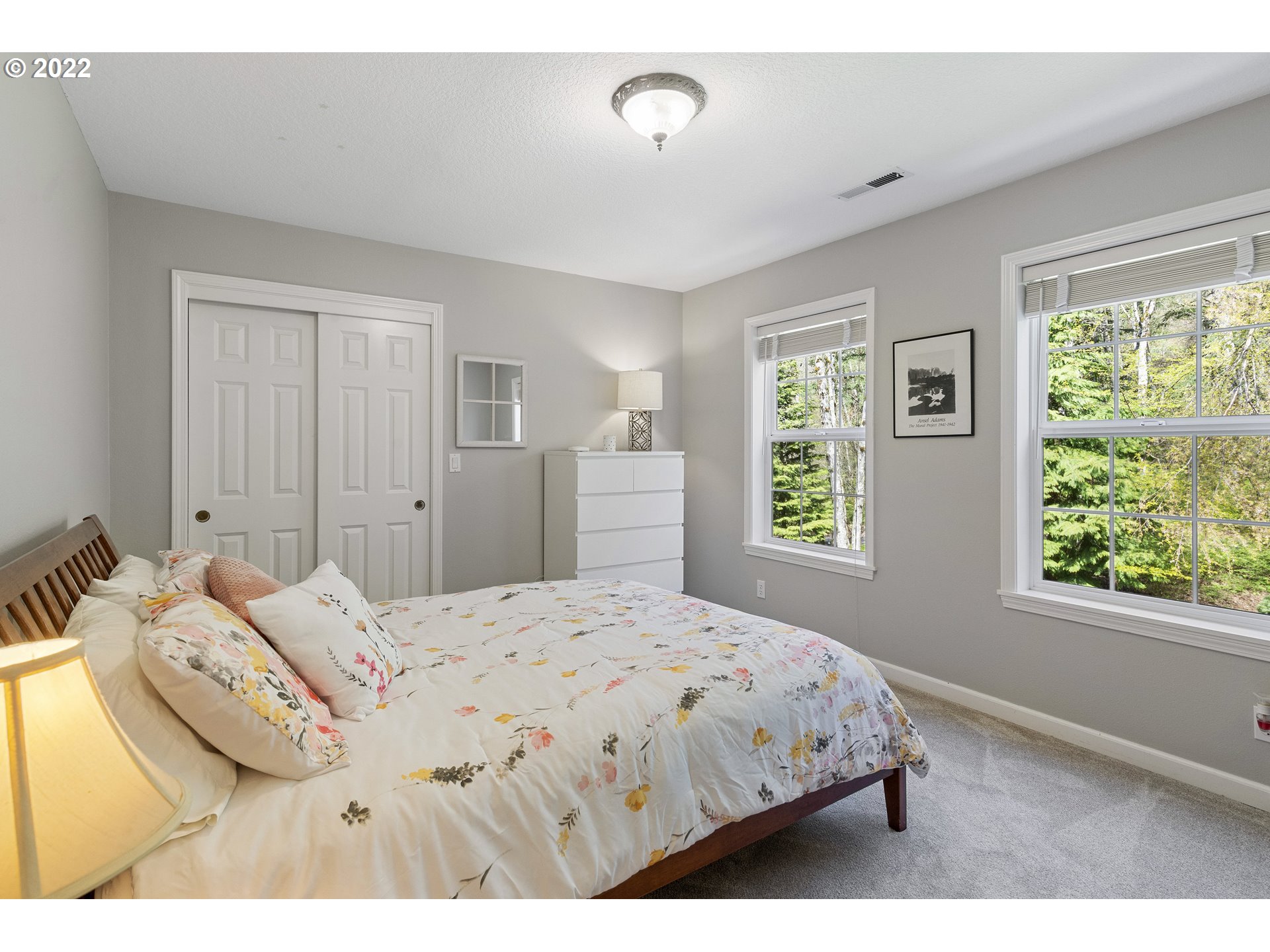 28501 Northeast 67th Street Camas, WA 98607 - Photo 24 of 32 a bedroom with a bed and a window