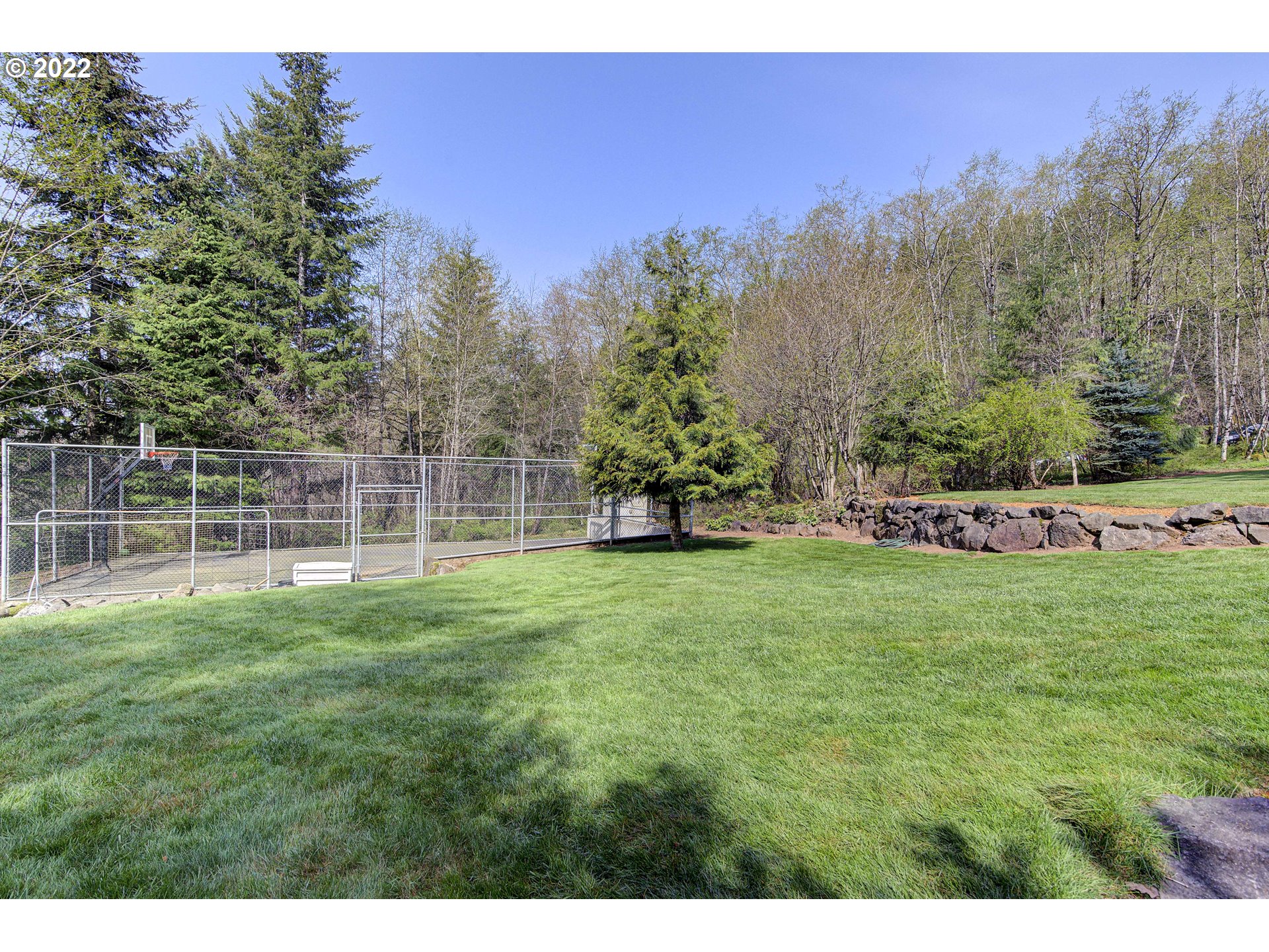 28501 Northeast 67th Street Camas, WA 98607 - Photo 31 of 32 a backyard of a house with lots of green space