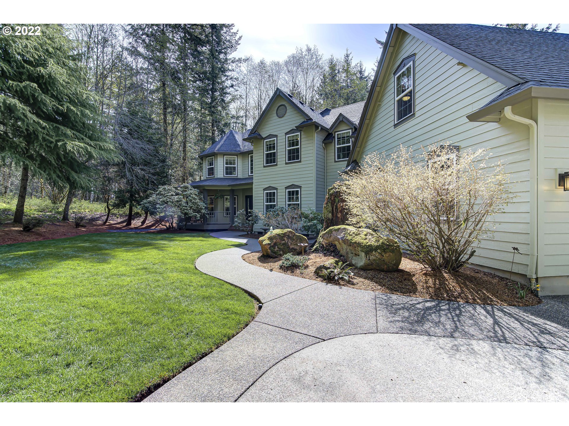 28501 Northeast 67th Street Camas, WA 98607 - Photo 5 of 32 a view of a house with a yard
