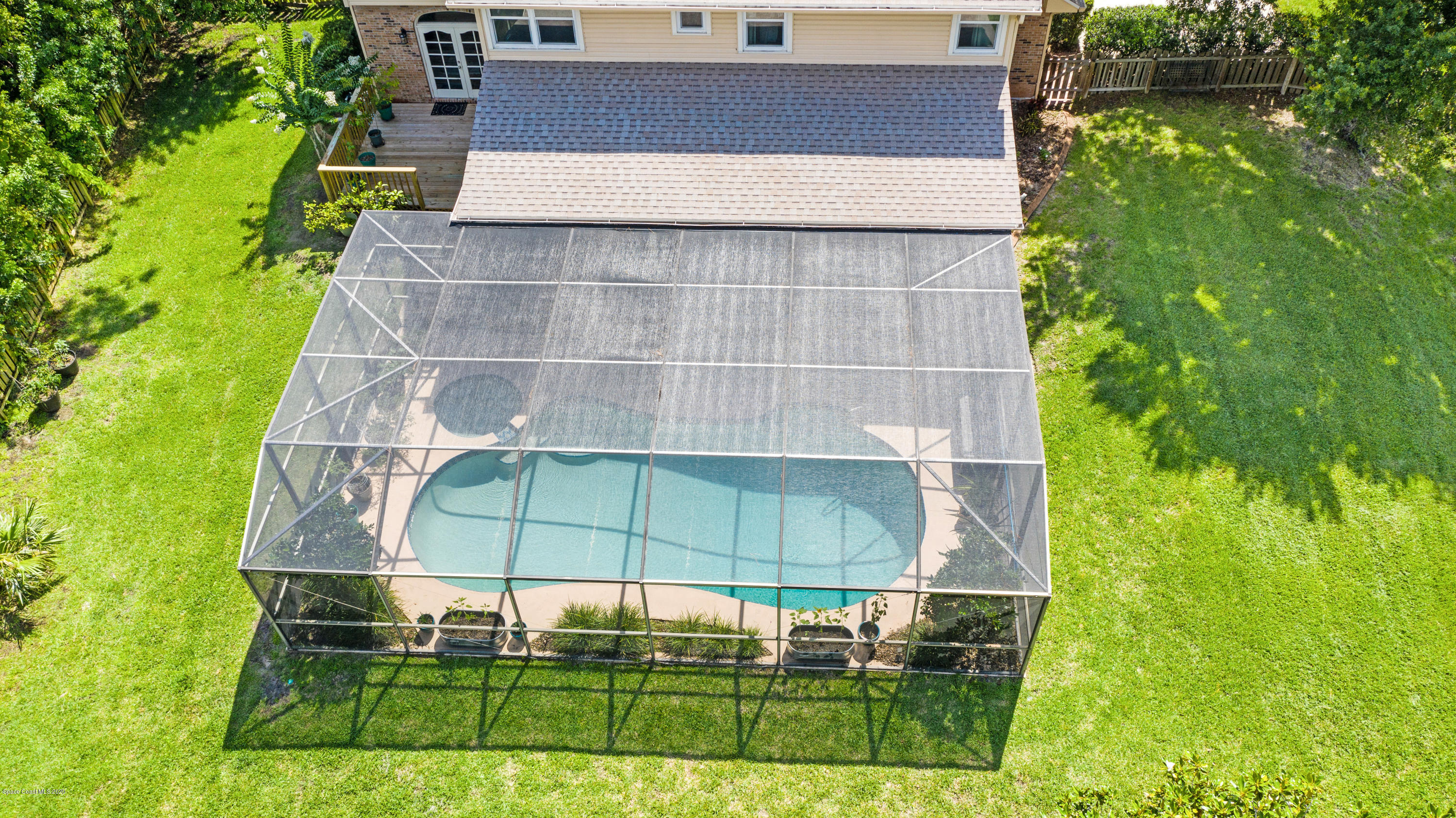 4044 Sparrow Hawk Road Melbourne, FL 32934 - Photo 13 of 63 Aerial Rear