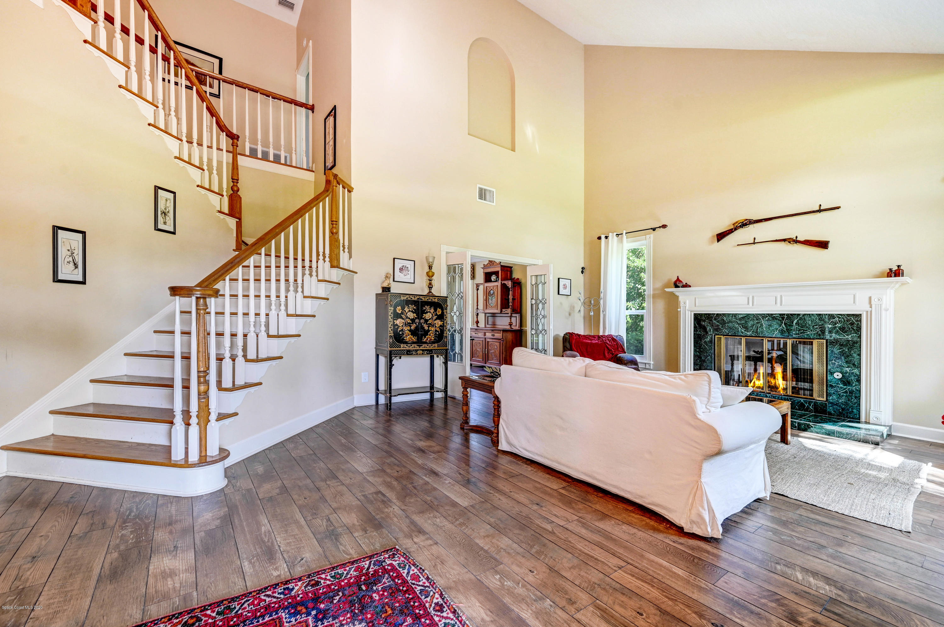4044 Sparrow Hawk Road Melbourne, FL 32934 - Photo 18 of 63 Stairwell/Living