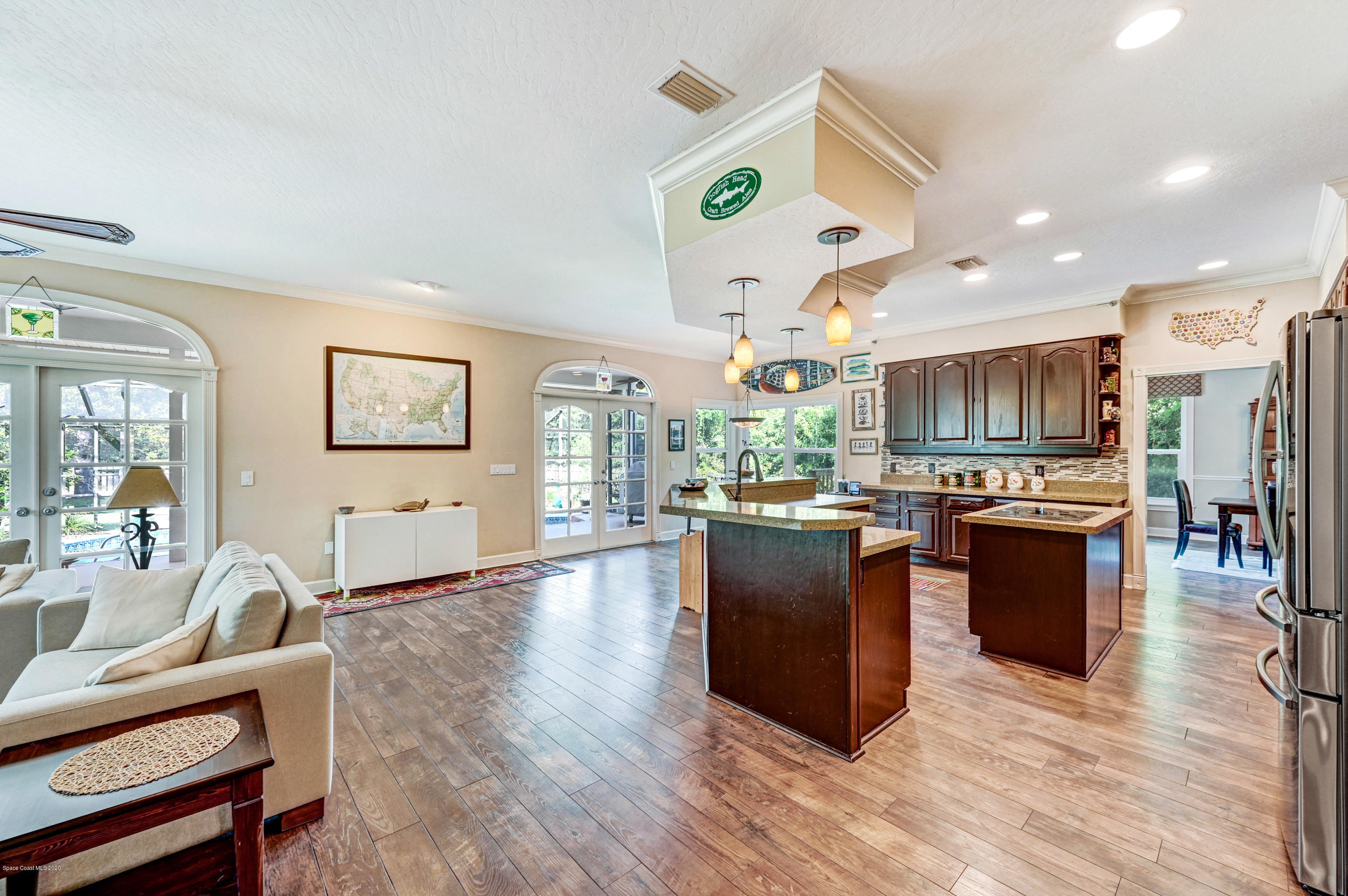 4044 Sparrow Hawk Road Melbourne, FL 32934 - Photo 30 of 63 Family/Kitchen