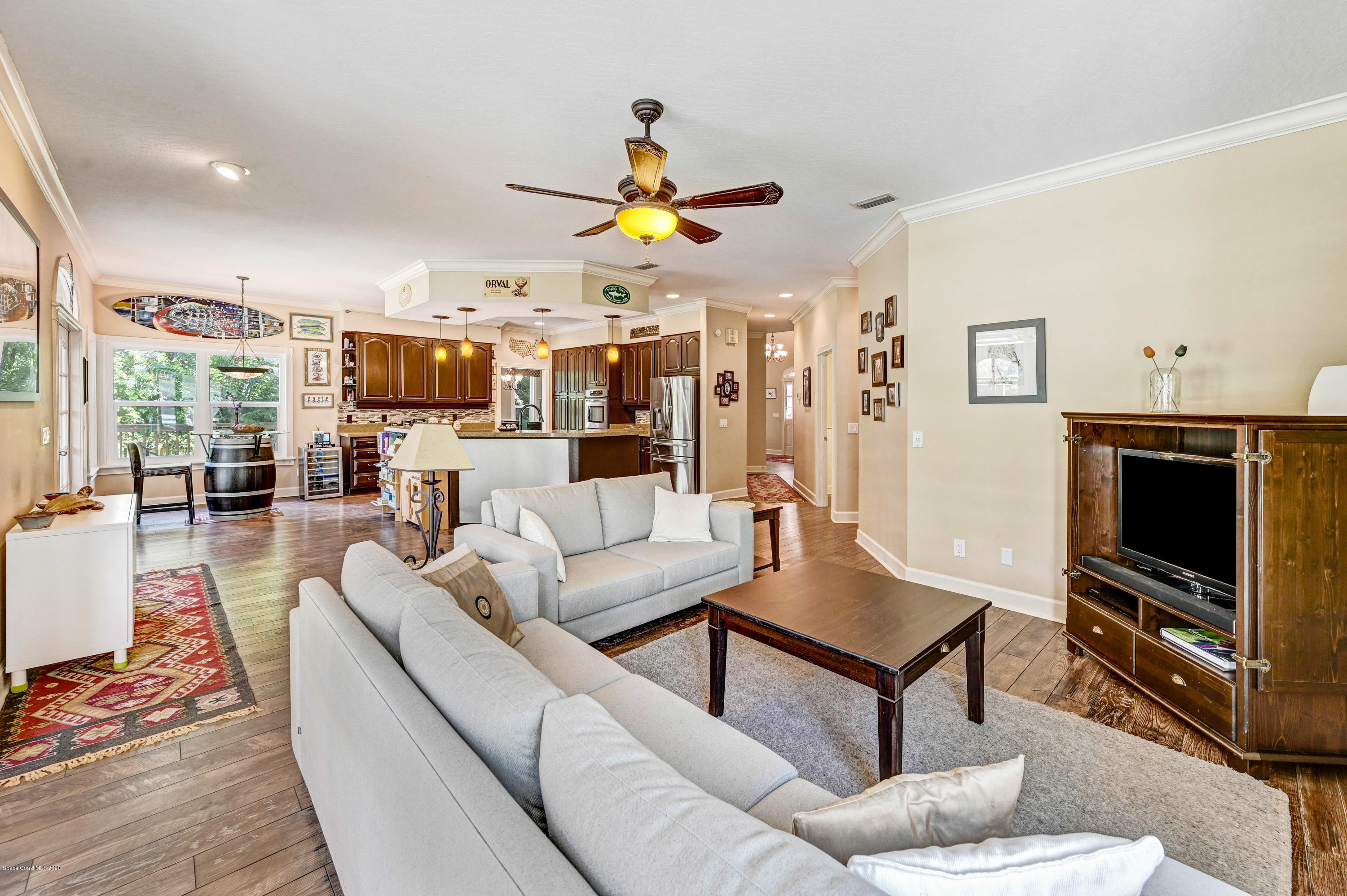 4044 Sparrow Hawk Road Melbourne, FL 32934 - Photo 31 of 63 Family to Kitchen