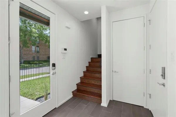 a view of entryway with stairs