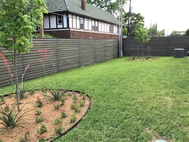 a view of a backyard with a garden