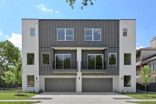 a view of a building with a garden