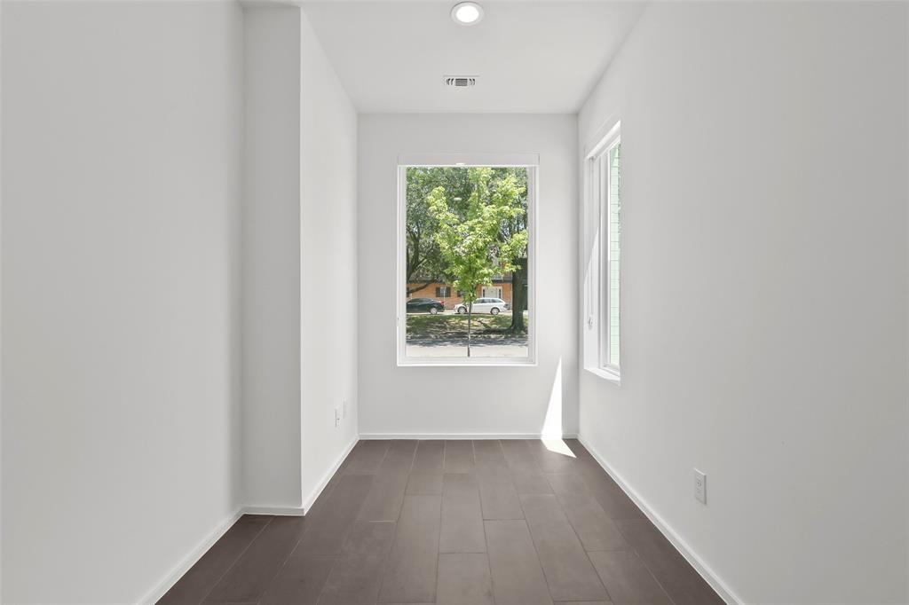 6250 Oram Street, Unit 102 Dallas, TX 75214 - Photo 3 of 21 a view of an empty room with a window