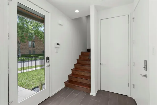 a view of entryway with stairs