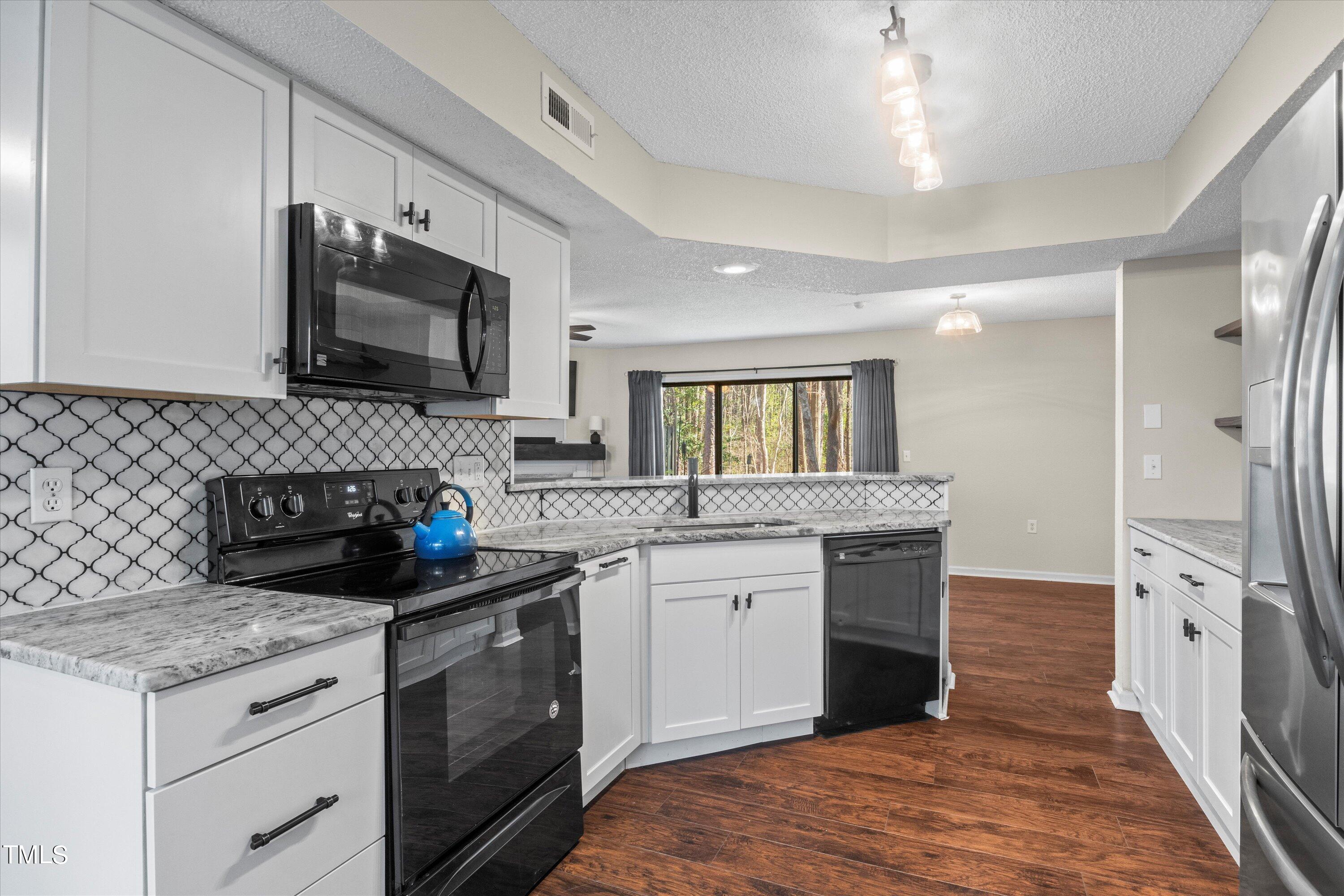 2443 Condor Court Raleigh, NC 27615 - Photo 6 of 31 Updated Kitchen