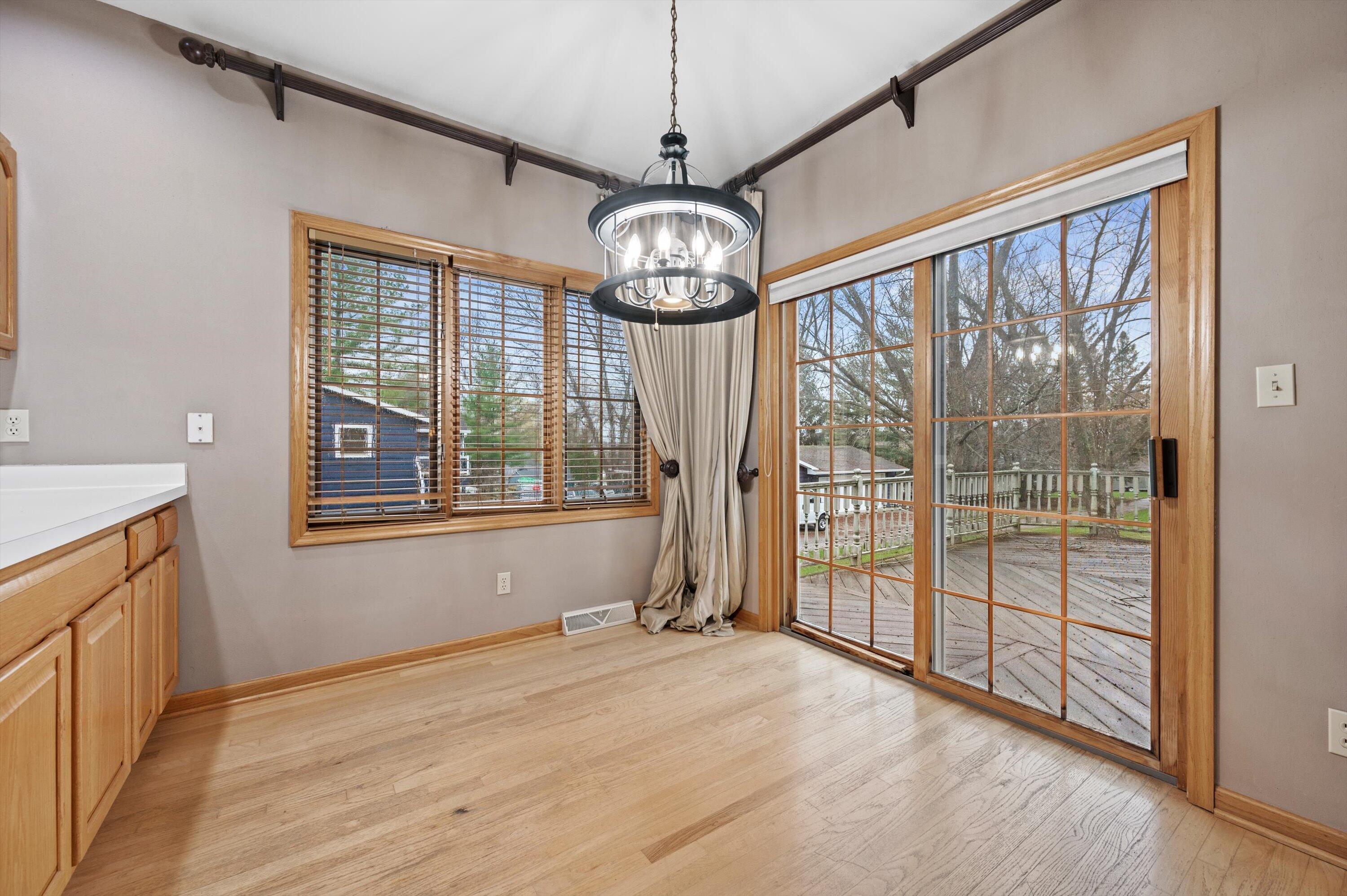 4009 Hickory Knoll Road Delafield, WI 53029 - Photo 13 of 43 Sliding Door Off Dining Space