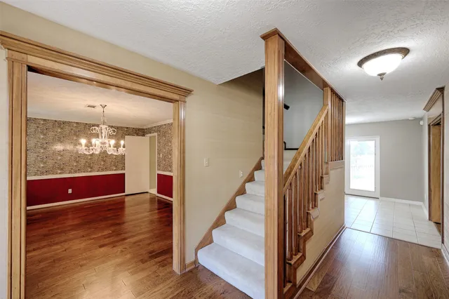 a view of entryway with wooden floor