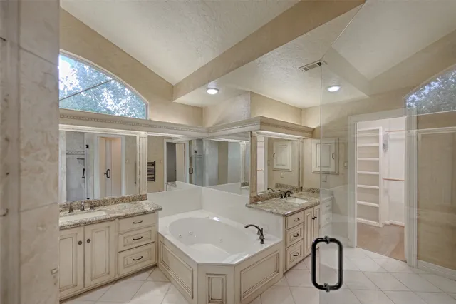 a view of a hallway with wooden shelves