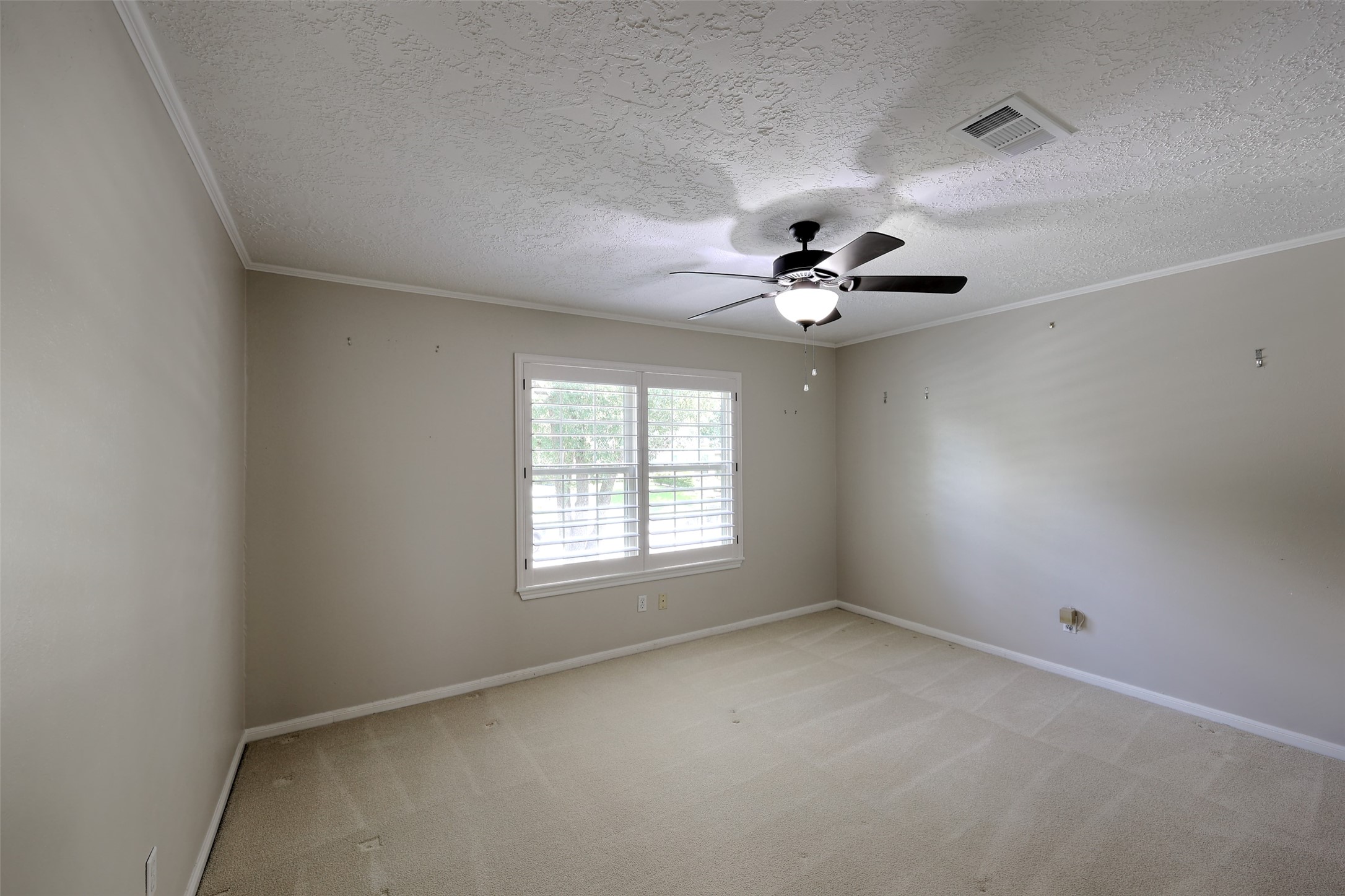 206 Virginia Lane Conroe, TX 77304 - Photo 25 of 36 a view of an empty room with a window