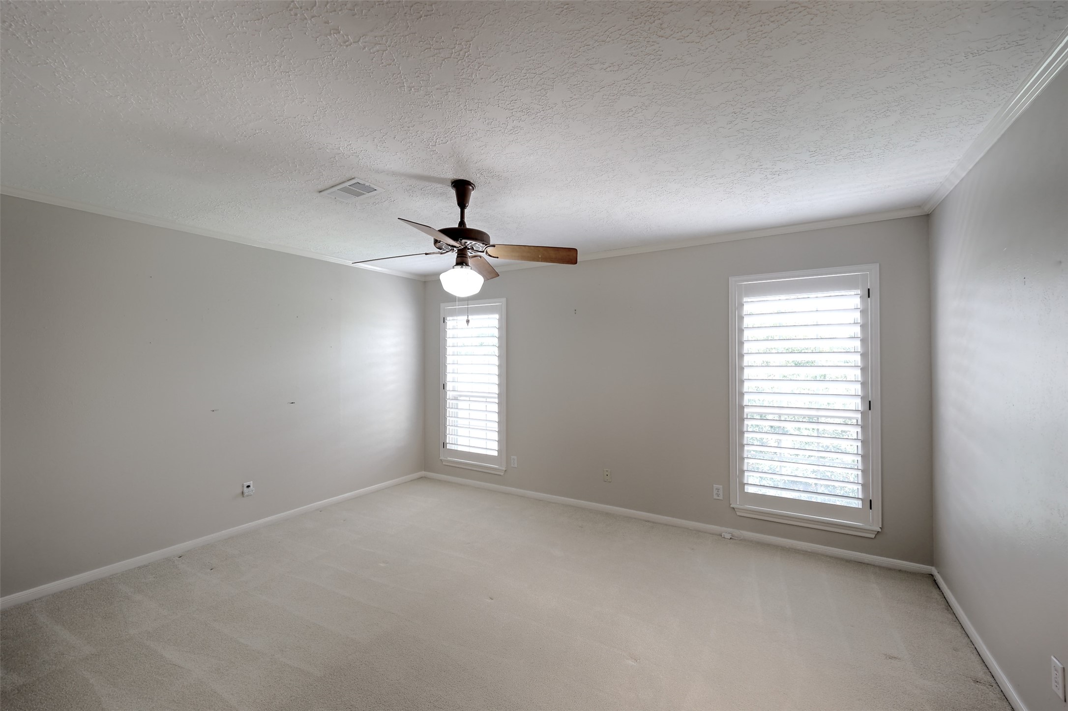 206 Virginia Lane Conroe, TX 77304 - Photo 28 of 36 a view of a livingroom with a ceiling fan and window