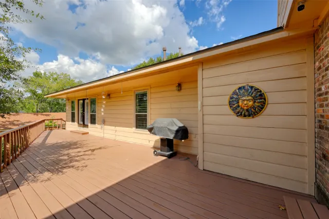 a view of swimming pool with seating space