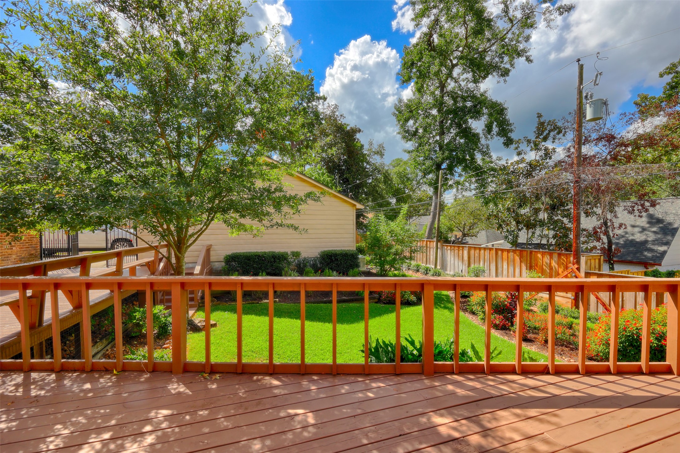 206 Virginia Lane Conroe, TX 77304 - Photo 33 of 36 a view of a house with a backyard