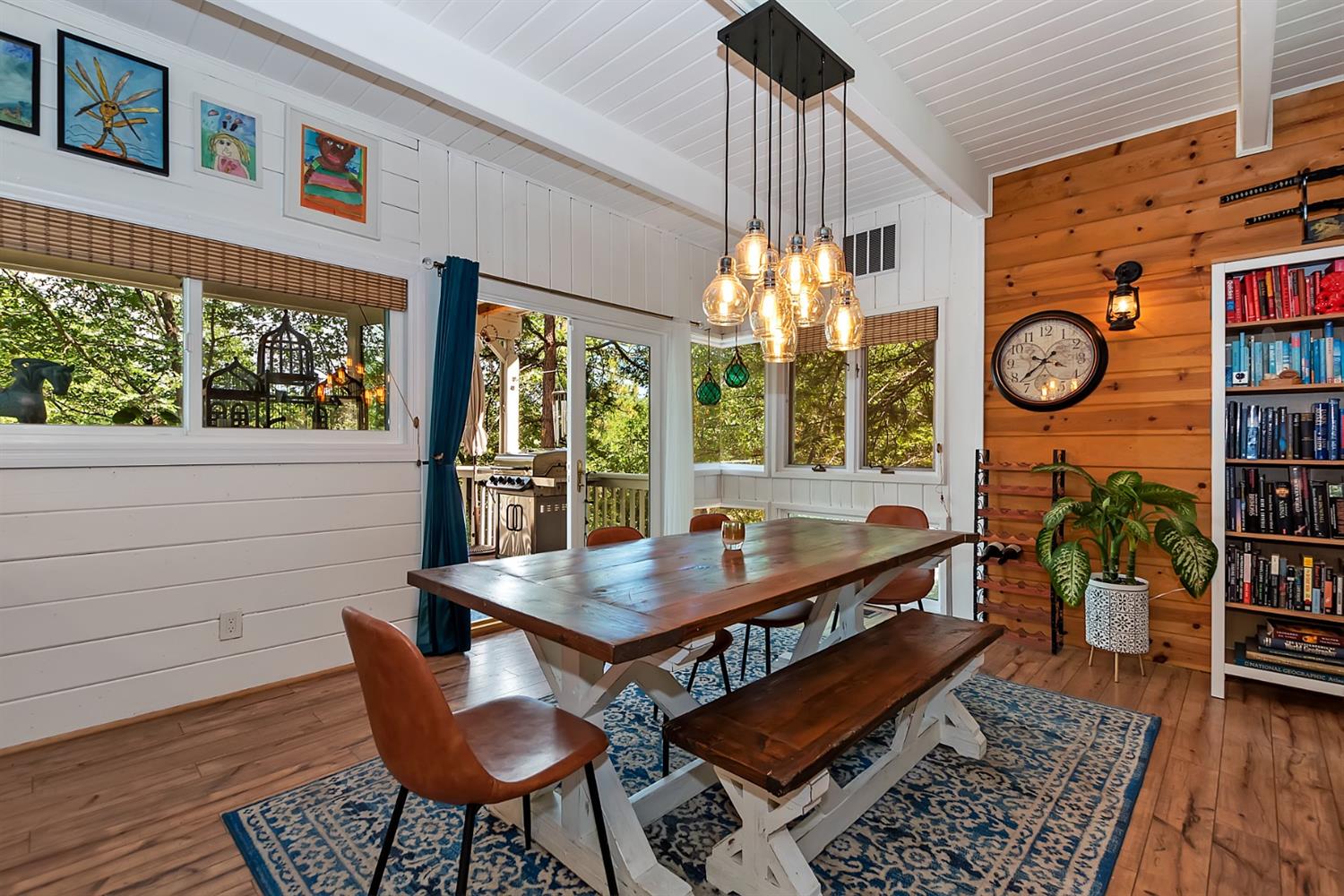 28277 Arbon Lane Lake Arrowhead, CA 92352 - Photo 14 of 50 a dining room with furniture wooden floor and a rug