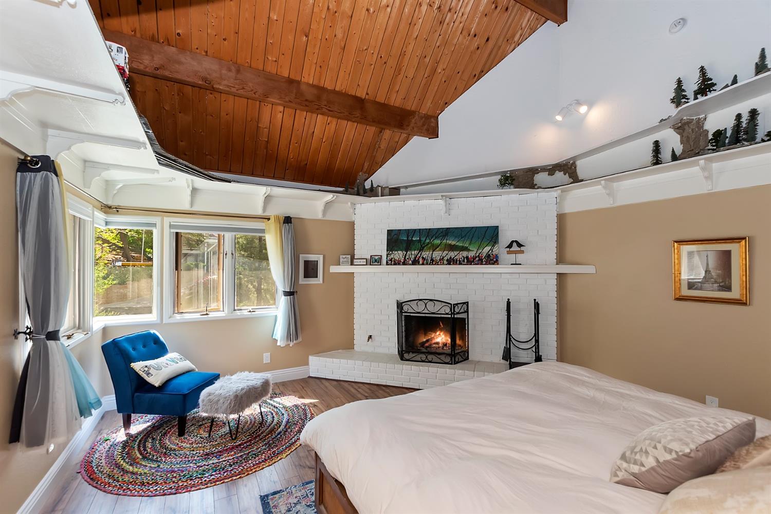 28277 Arbon Lane Lake Arrowhead, CA 92352 - Photo 23 of 50 a living room with furniture a fireplace and a flat screen tv