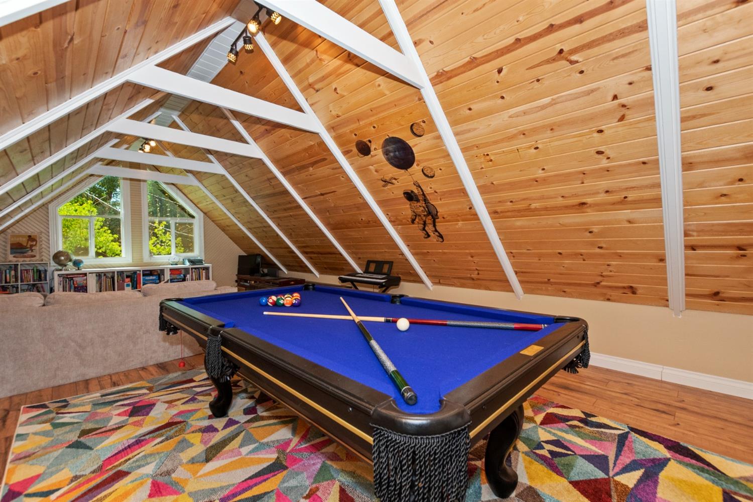 28277 Arbon Lane Lake Arrowhead, CA 92352 - Photo 35 of 50 a blue chair sitting in front of a building