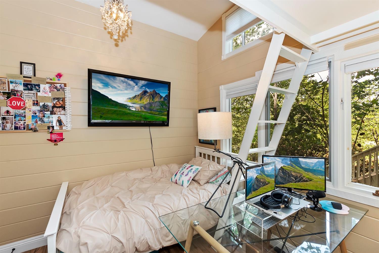 28277 Arbon Lane Lake Arrowhead, CA 92352 - Photo 39 of 50 a bedroom with a bed and a flat screen tv