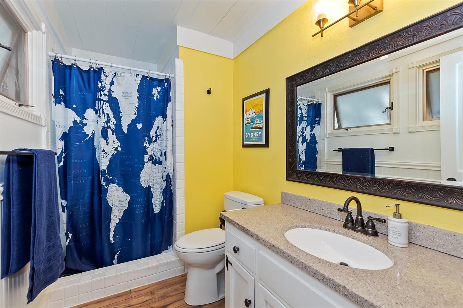 28277 Arbon Lane Lake Arrowhead, CA 92352 - Photo 43 of 50 a bathroom with a granite countertop sink toilet and mirror