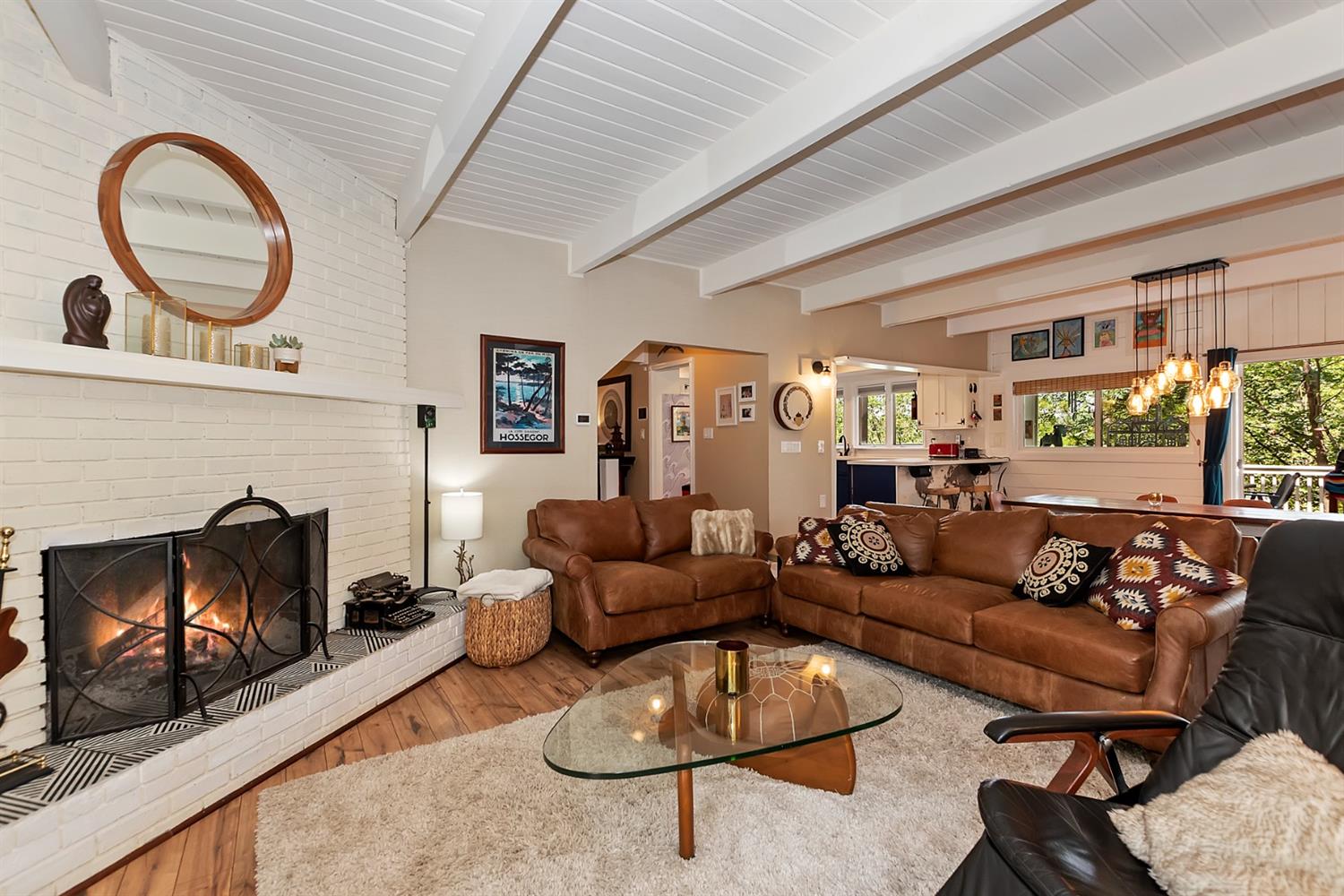 28277 Arbon Lane Lake Arrowhead, CA 92352 - Photo 7 of 50 a living room with furniture a fireplace and a large window