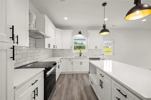 a bathroom with a sink and mirror