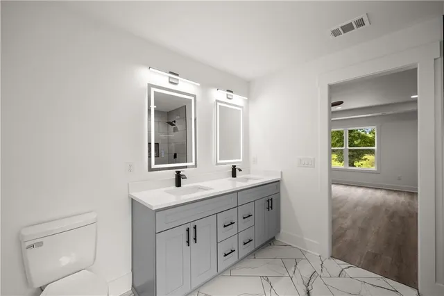 an aerial view of a golf course with chairs