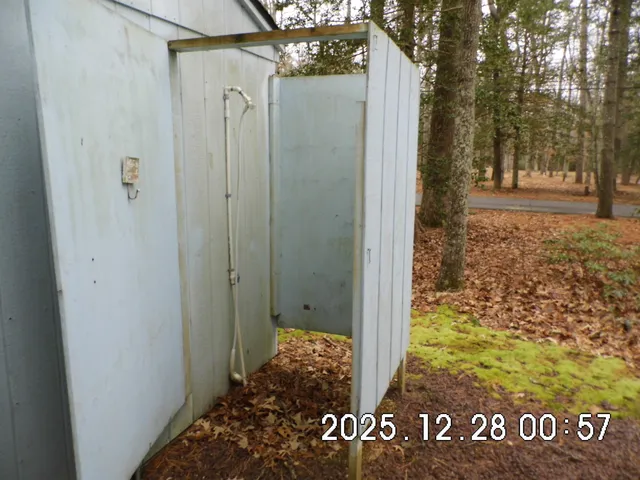 a view of a house with a street
