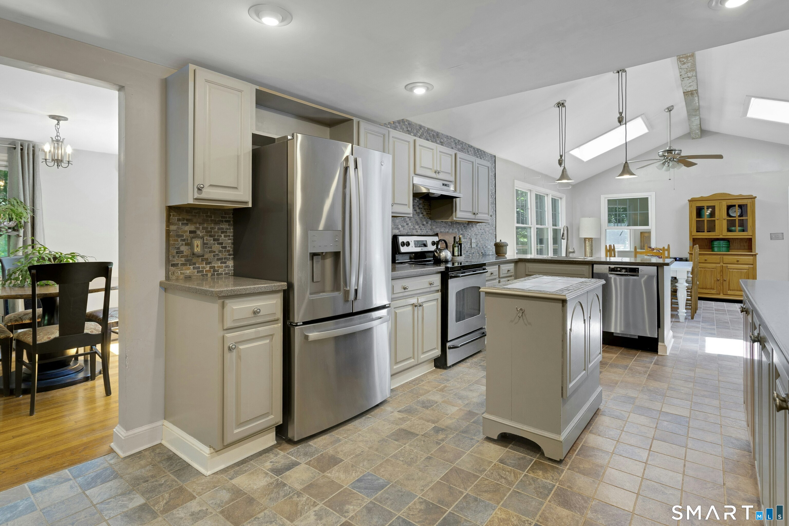 65 Barrows Road Easton, CT 06612 - Photo 15 of 38 Open to Vaulted Ceiling with Skylights over Breakfast Area