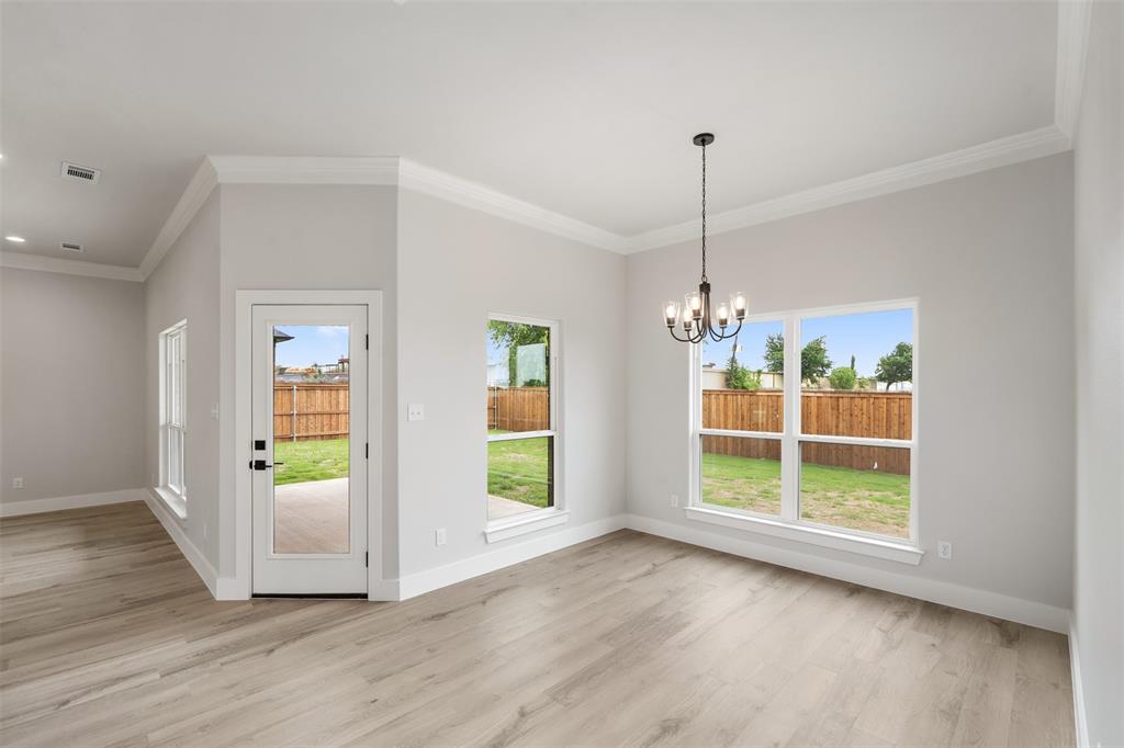505 Limestone Circle Mabank, TX 75147 - Photo 16 of 37 a view of a room with wooden floor outdoor space and windows