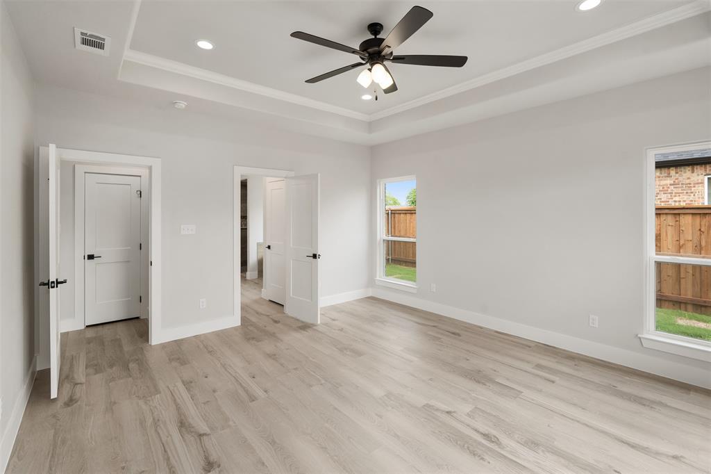 505 Limestone Circle Mabank, TX 75147 - Photo 18 of 37 wooden floor in an empty room with a window