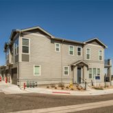 a view of a house with a street