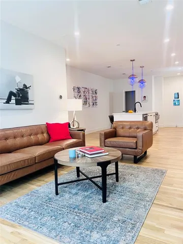 a living room with furniture and a couch