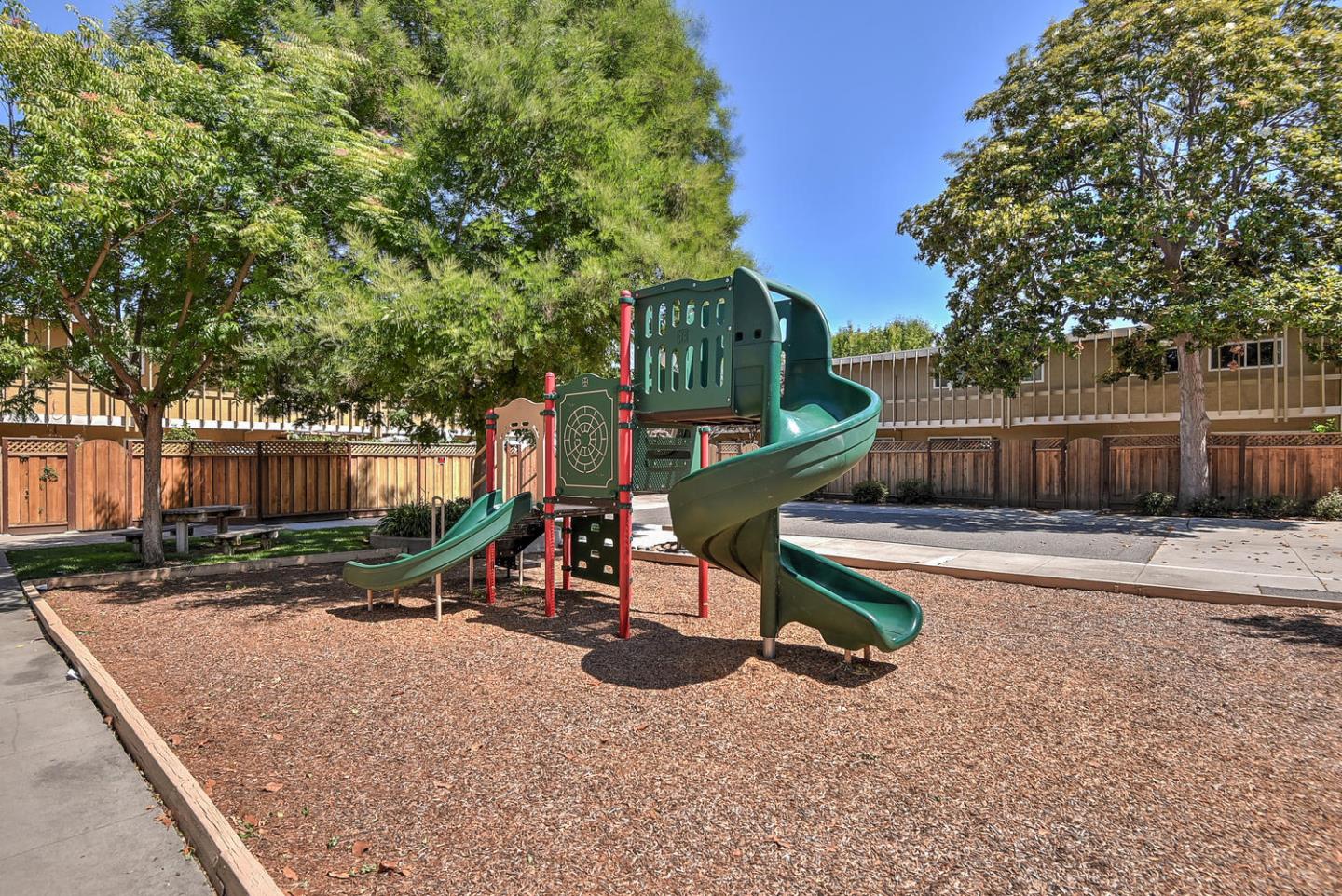 836 Pomeroy Avenue, Unit 70 Santa Clara, CA 95051 - Photo 16 of 17 a view of a park with slide