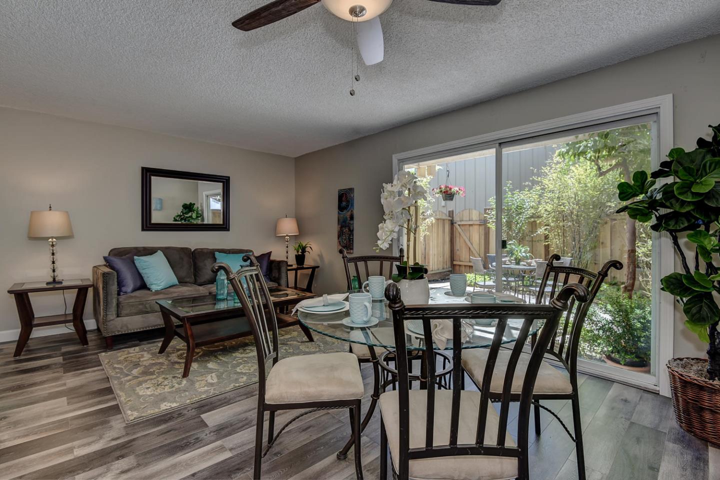 836 Pomeroy Avenue, Unit 70 Santa Clara, CA 95051 - Photo 5 of 17 a view of a dining room with furniture window and outside view