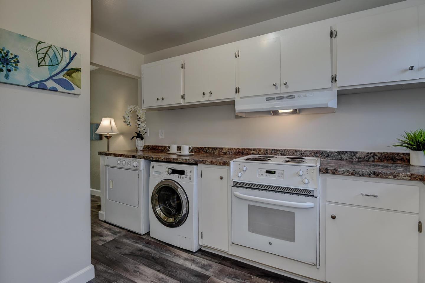 836 Pomeroy Avenue, Unit 70 Santa Clara, CA 95051 - Photo 8 of 17 a utility room with sink dryer and washer