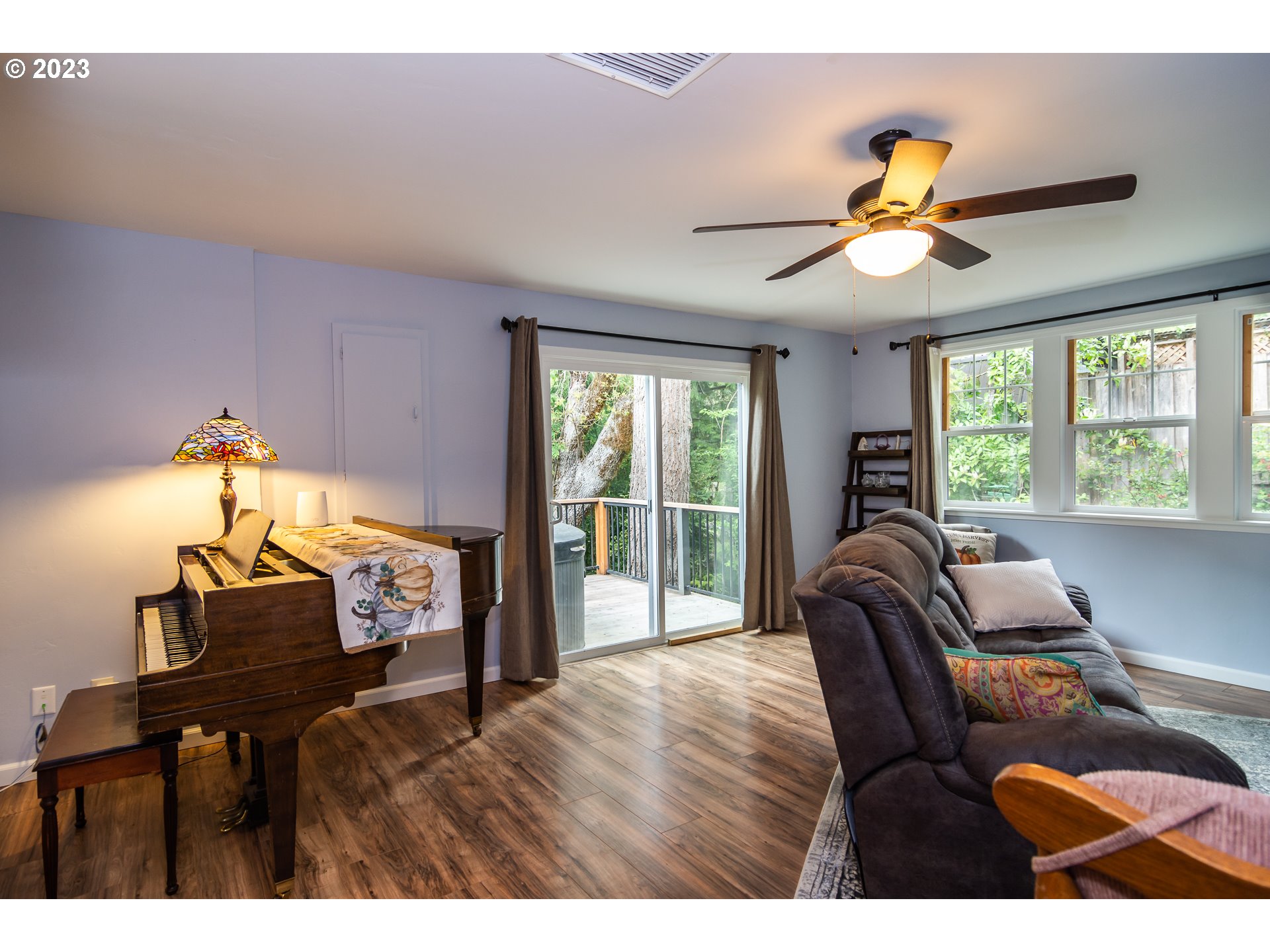11533 Tyee Road Umpqua, OR 97486 - Photo 12 of 45 a living room with furniture and a large window