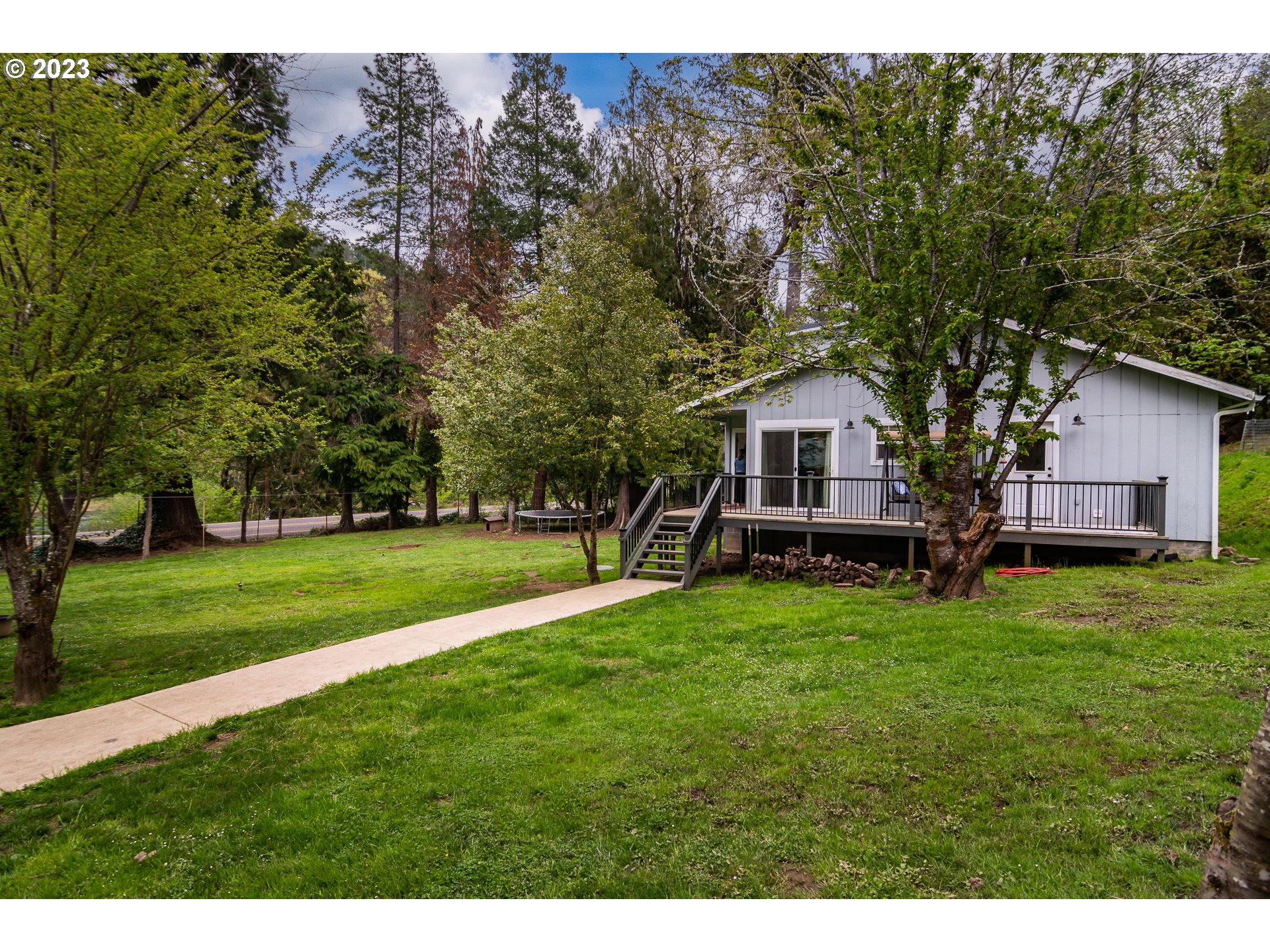 11533 Tyee Road Umpqua, OR 97486 - Photo 4 of 45 a house view with a garden space