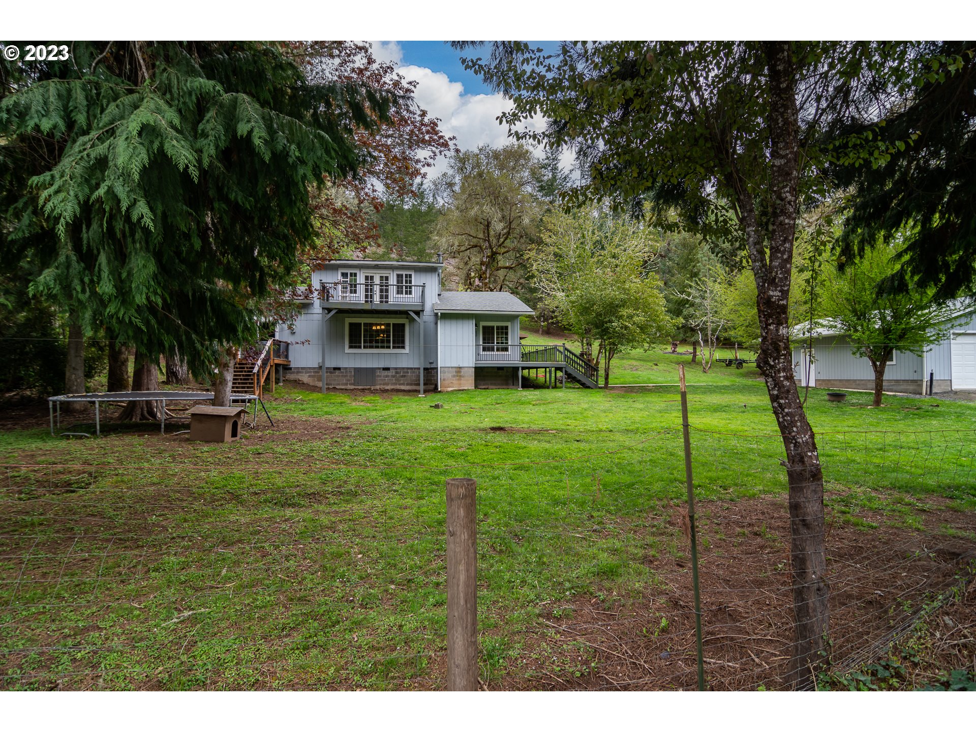 11533 Tyee Road Umpqua, OR 97486 - Photo 42 of 45 a view of a house with a yard