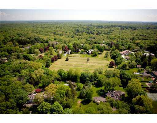 487 North Street Greenwich, CT 06830 - Photo 2 of 10 an aerial view of a houses with outdoor space
