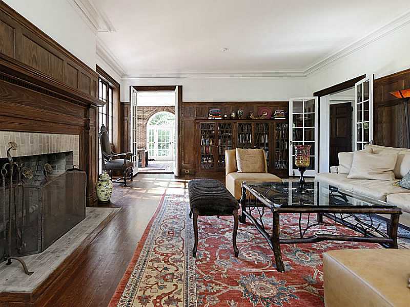 487 North Street Greenwich, CT 06830 - Photo 4 of 10 a living room with furniture and a fireplace