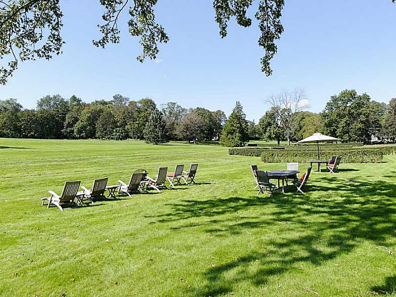 487 North Street Greenwich, CT 06830 - Photo 9 of 10 a view of a park with large trees